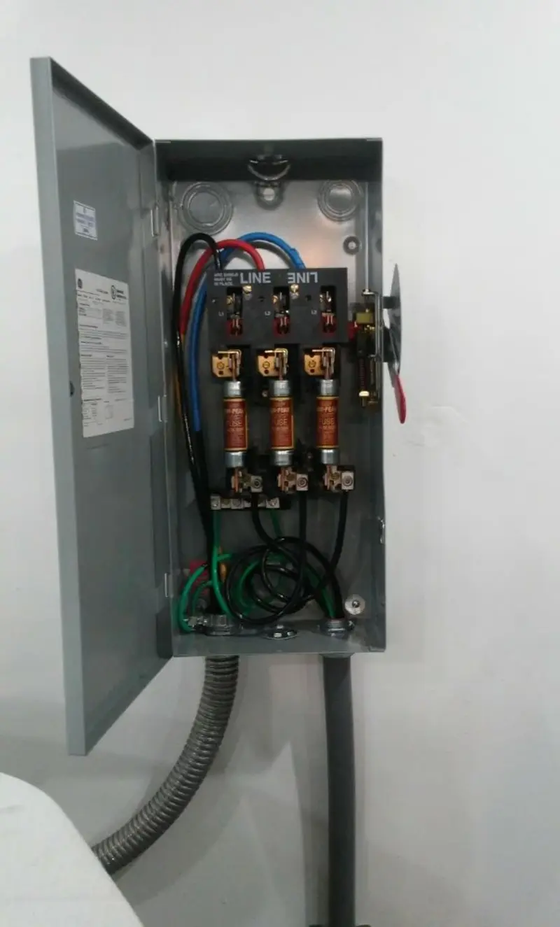 Three-phase disconnect switch installed for Smoke Detector Installation in Bystrom